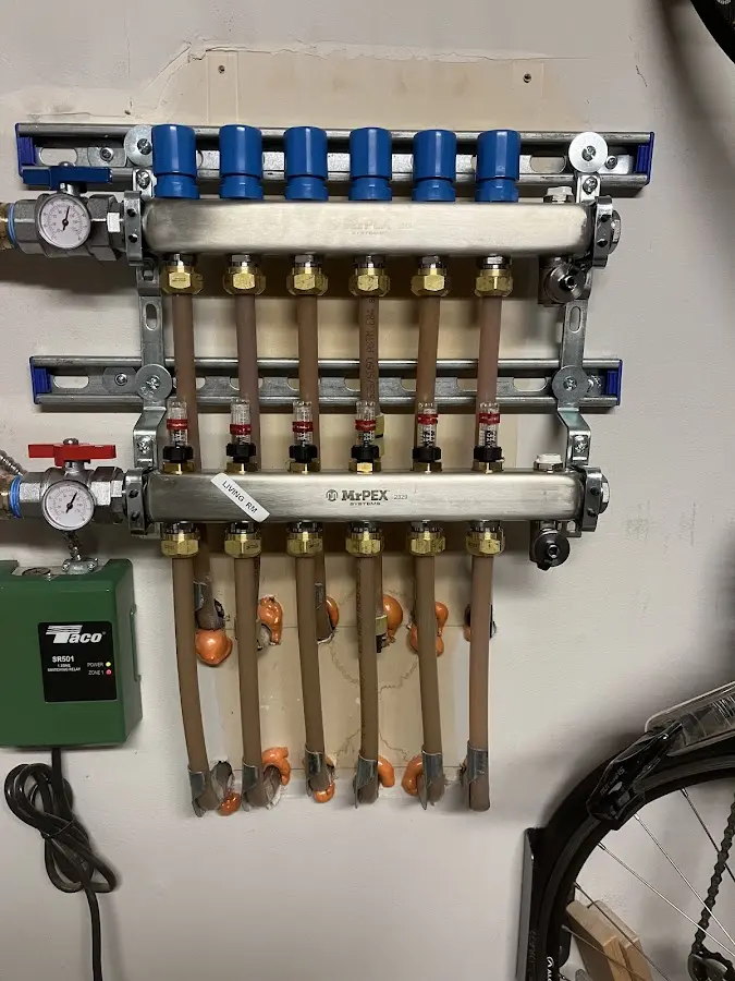 Plumber performing Water Heater Repair at a residential property in Hoffman Estates